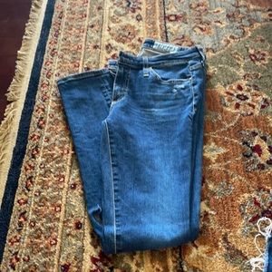 Skinny distressed AG jean. Low rise. Size 24R